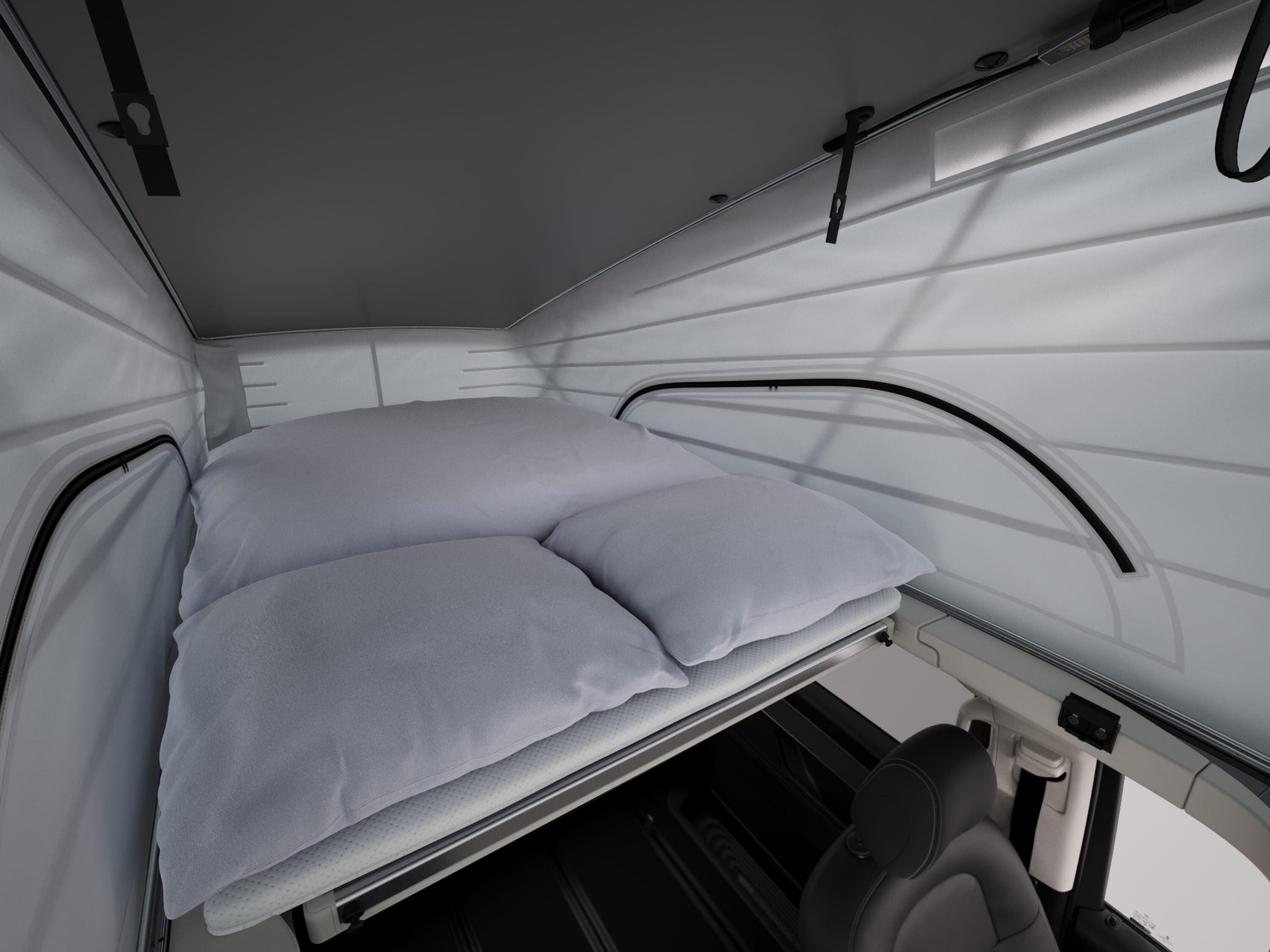 Zona de descanso del Mercedes-Benz Marco Polo HORIZON con una cómoda litera en el interior del techo desplegable.