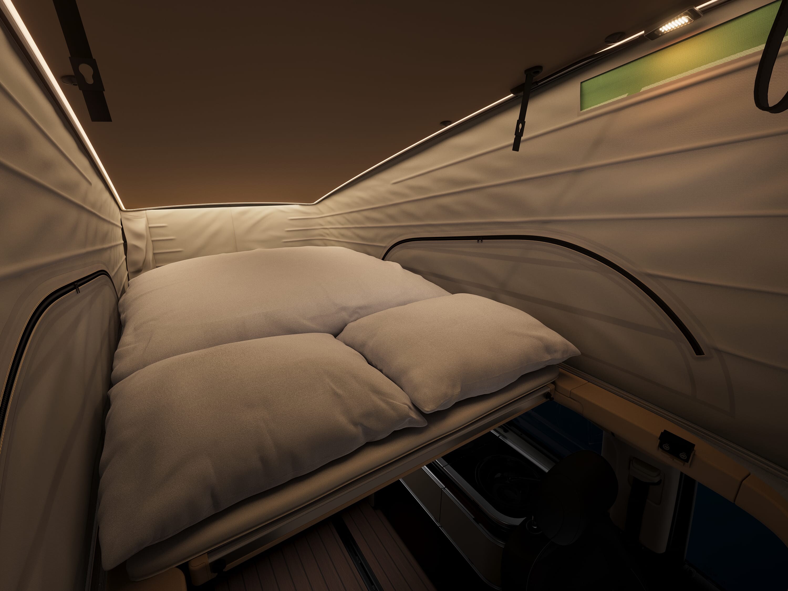 Zona de descanso del Mercedes-Benz Marco Polo con una cómoda cama en el interior del techo desplegable.