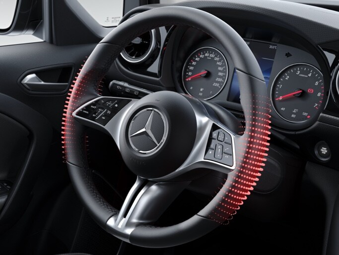 El volante multifunción calefactado del puesto de conducción de la Clase T de Mercedes-Benz.