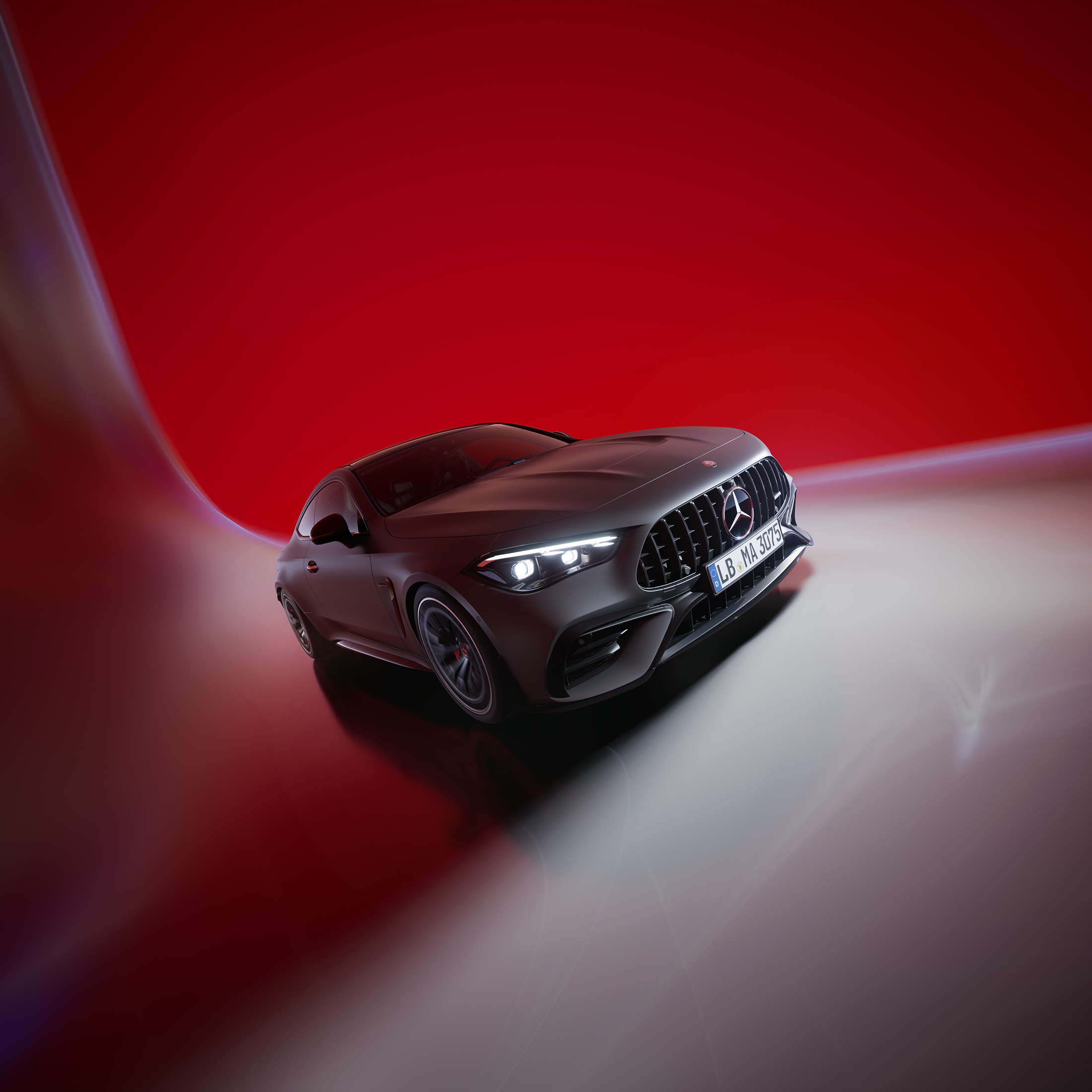 Visual frontal lateral de un CLE Coupé negro de Mercedes-AMG en un fondo rojo.