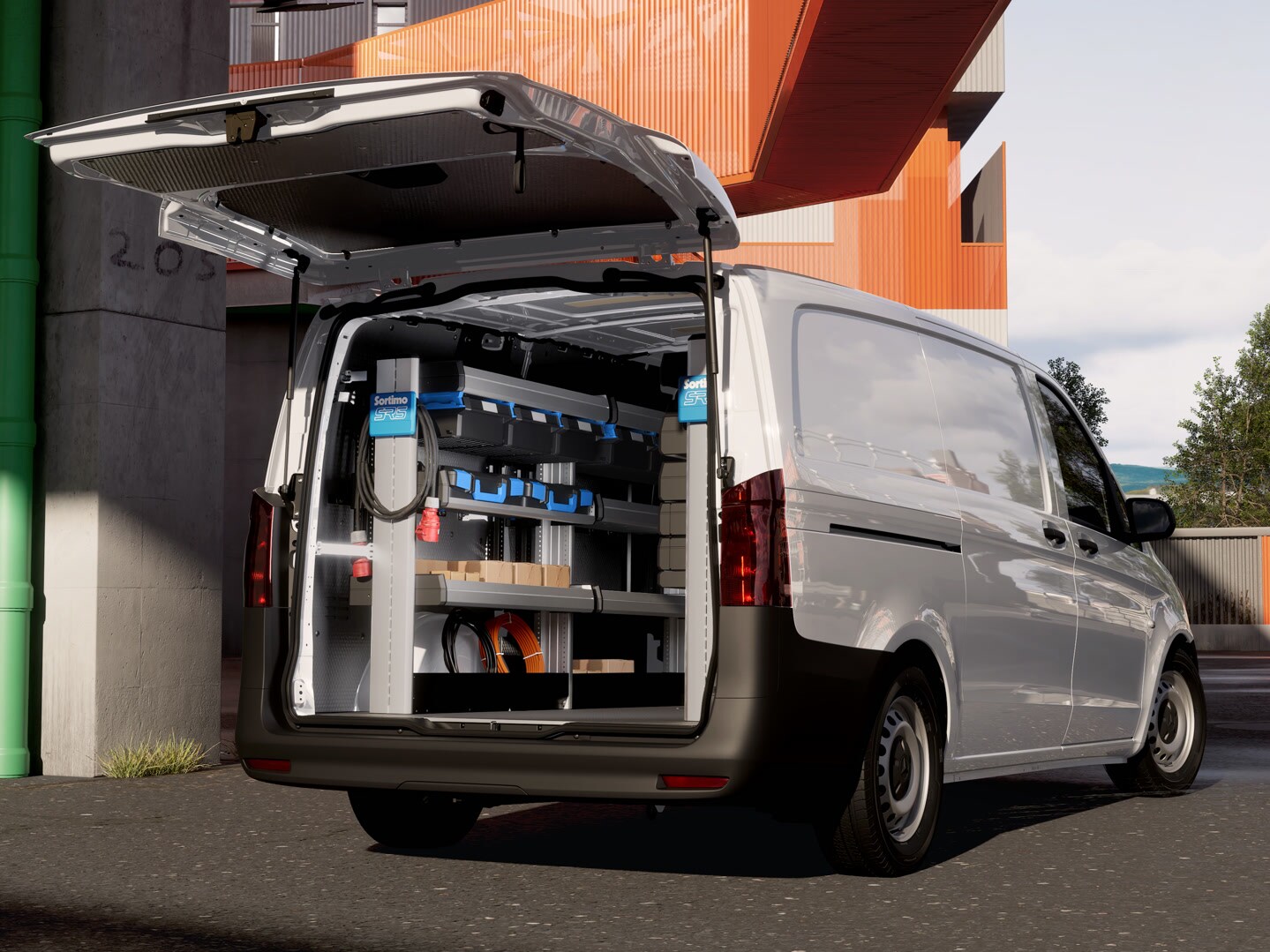 Furgoneta Mercedes-Benz con modificación como taller profesional. La zona de carga abierta cuenta con sistemas de estanterías y cajas para brindar trabajos eficientes de servicio, mantenimiento y gremios en un entorno urbano.