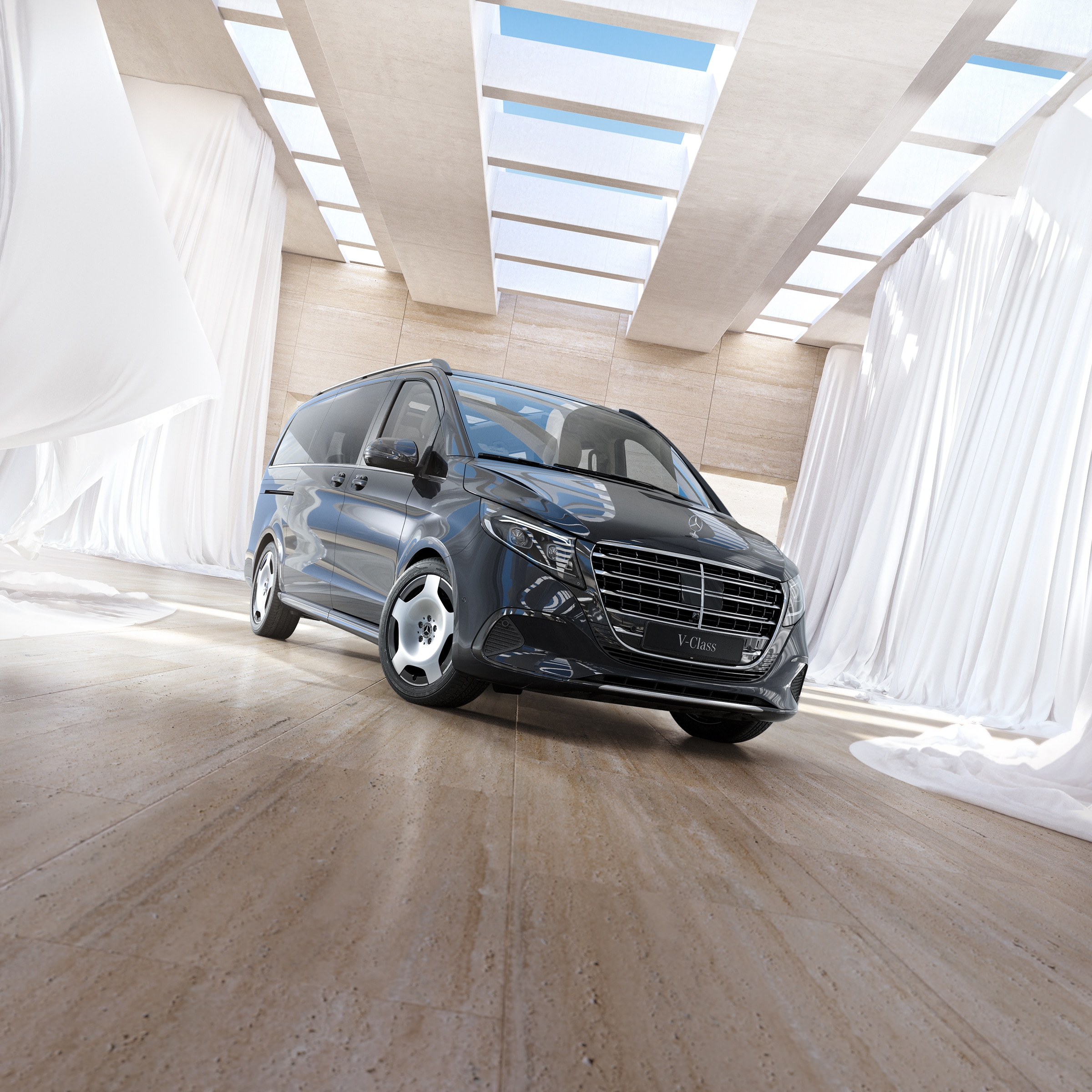 Clase V | Historia de los vehículos industriales | Mercedes-Benz Furgoneta de pasajeros Mercedes-Benz Clase V en un interior luminoso y moderno con claraboyas