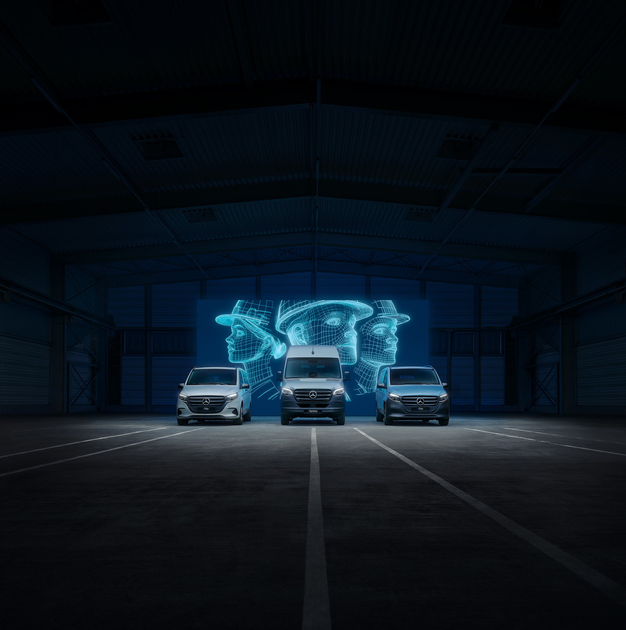 Conducción eléctrica | Modelos eléctricos | Mercedes-Benz Furgonetas eléctricas de Mercedes-Benz con conectividad digital en un moderno almacén logístico.