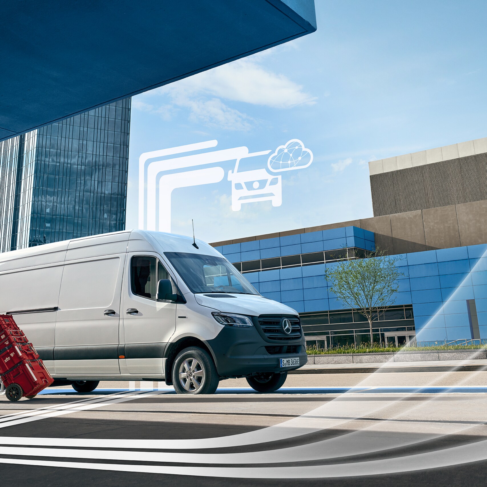 Una furgoneta Mercedes-Benz con elementos gráficos que representan los extras digitales.