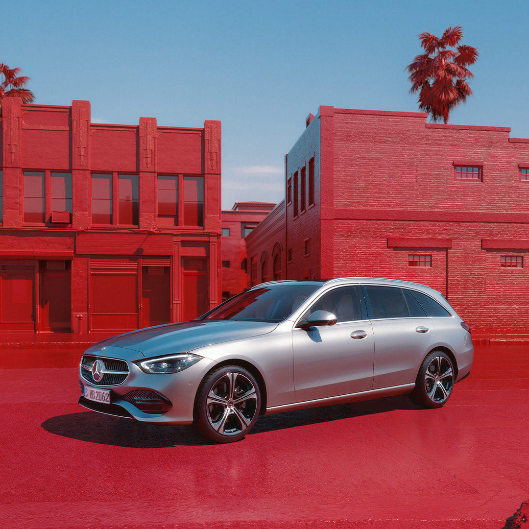 Oferta | Clase C Estate | Mercedes-Benz visual lateral de un Clase C Estate en color gris sobre un fondo rojo